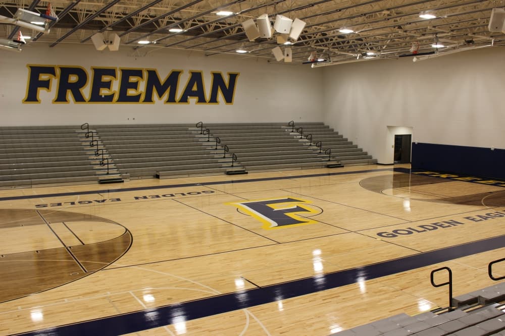 Freeman High School's competition gym includes graphics showcasing the school's colors. (Kelly Schafler/Community Impact)