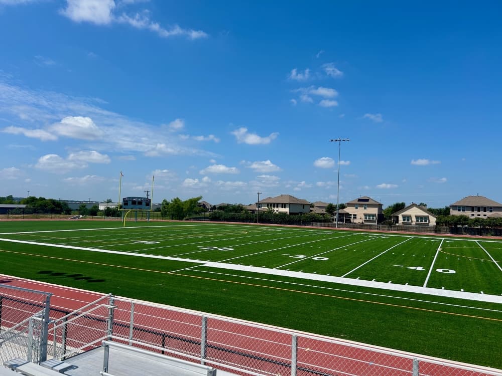 The campus has a turf field and four-lane track as well as bleachers on the home team's side. (Brooke Sjoberg/Community Impact)