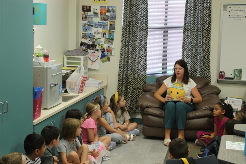 Third grade Teacher Caroline Presley talks to students on the first day of school Aug. 14.