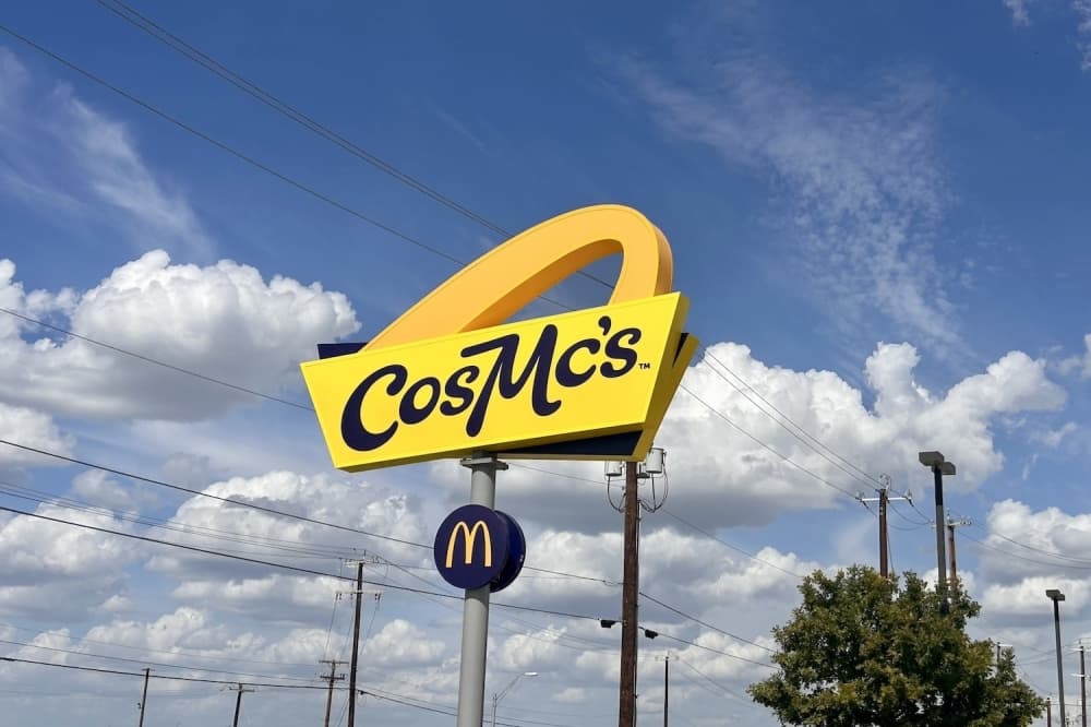 Photo shows a restaurant sign.