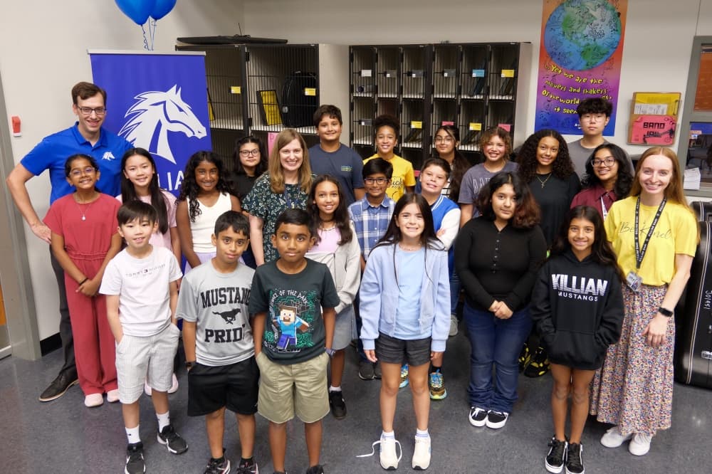 Superintendent Lori Rapp poses with students at Killian Middle School Aug. 13. (Courtesy Lewisville ISD) 