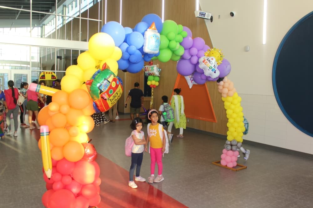 District staff decorated the entryway to greet students as they walked to class at the new elementary campus Aug. 14. (Don Munsch/Community Impact)