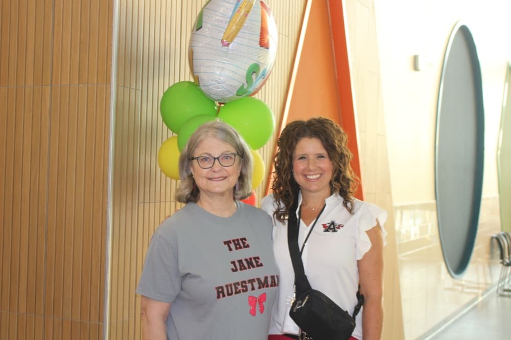 Superintendent Courtney Carpenter (right) poses with Jane Ruestmann on the first day of the 2024-25 school year. Ruestmann taught in the district for 40 years and is the school's namesake. (Don Munsch/Community Impact)