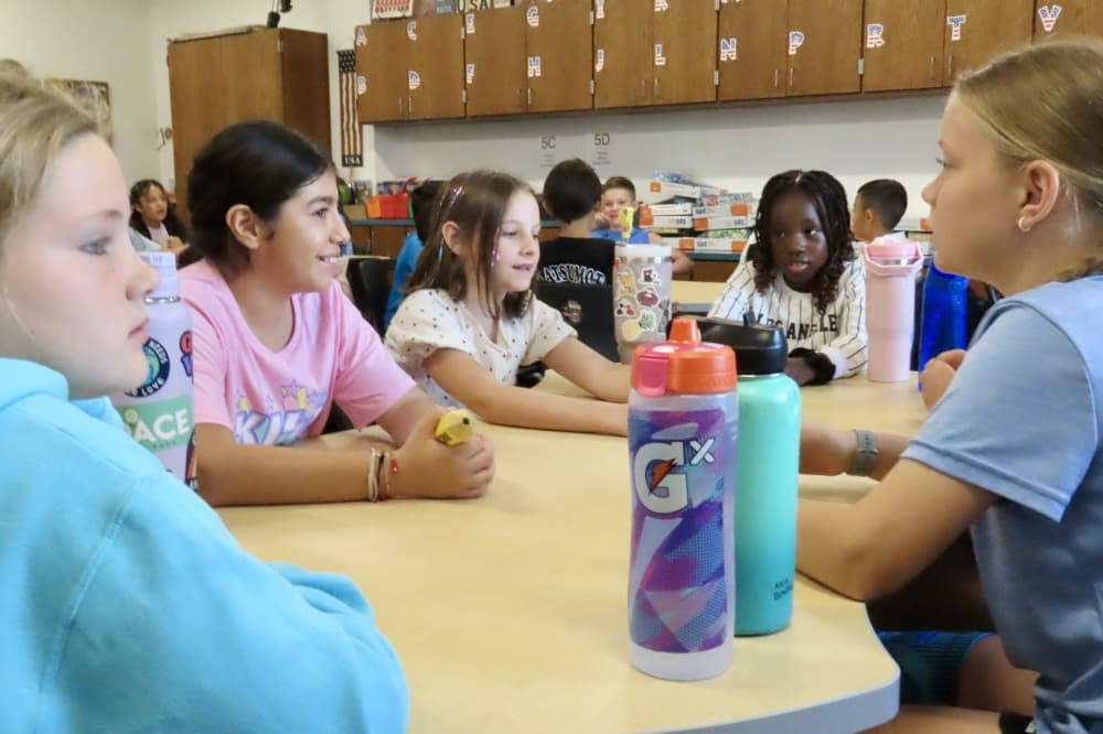Students settled into their seats at Wilson Elementary Aug. 14. (Jonathan Perriello/Community Impact)