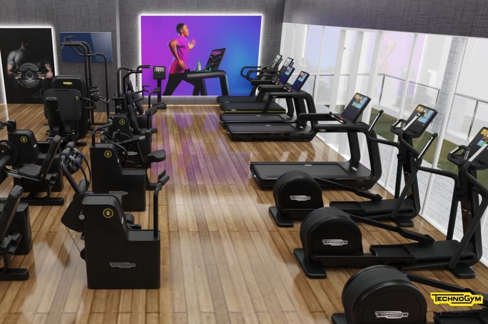 A fitness studio with treadmills and strength training stations. 