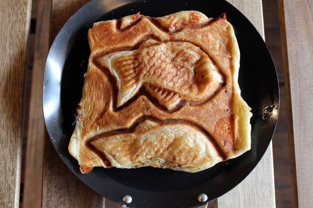 Pastry with fish shaped indentions. 