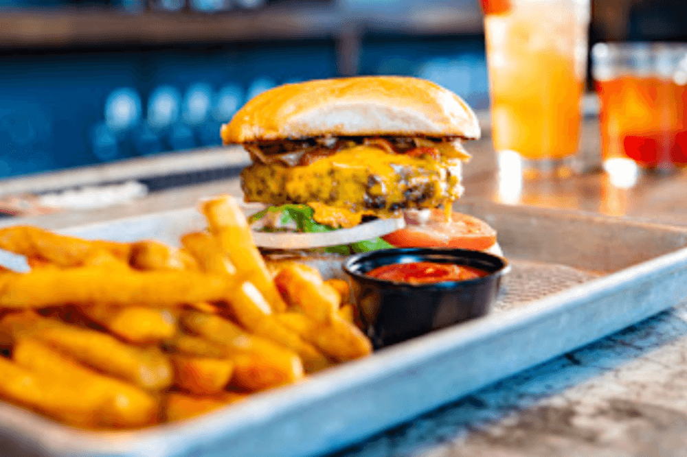 The Tavern Burger ($15) is the Tavern on Castell's signature which includes bacon, cheddar, grilled onions and mushrooms. (Courtesy Tavern on Castell)