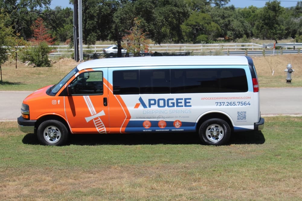 A 15-passenger van outside