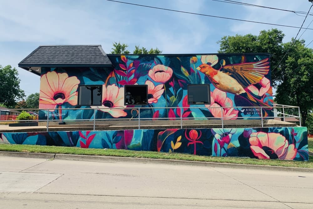 Local artist Andrea Holmes begins worldwide mural series with new public art piece in downtown McKinney