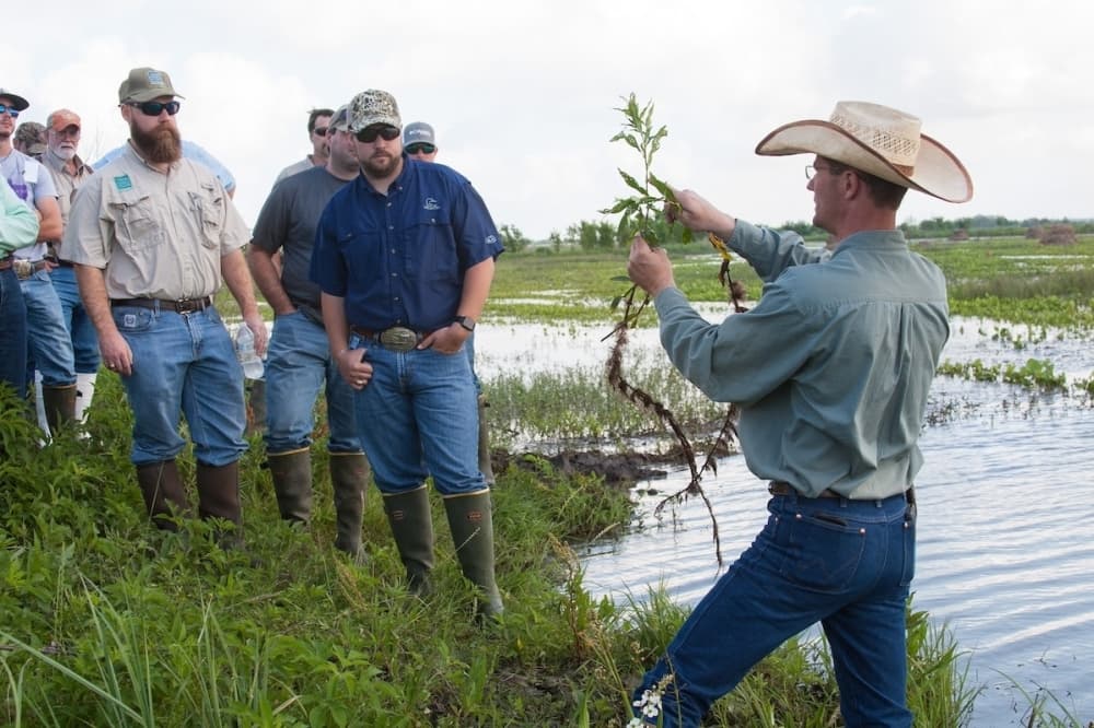 Photo shows a group of environmentalists. 