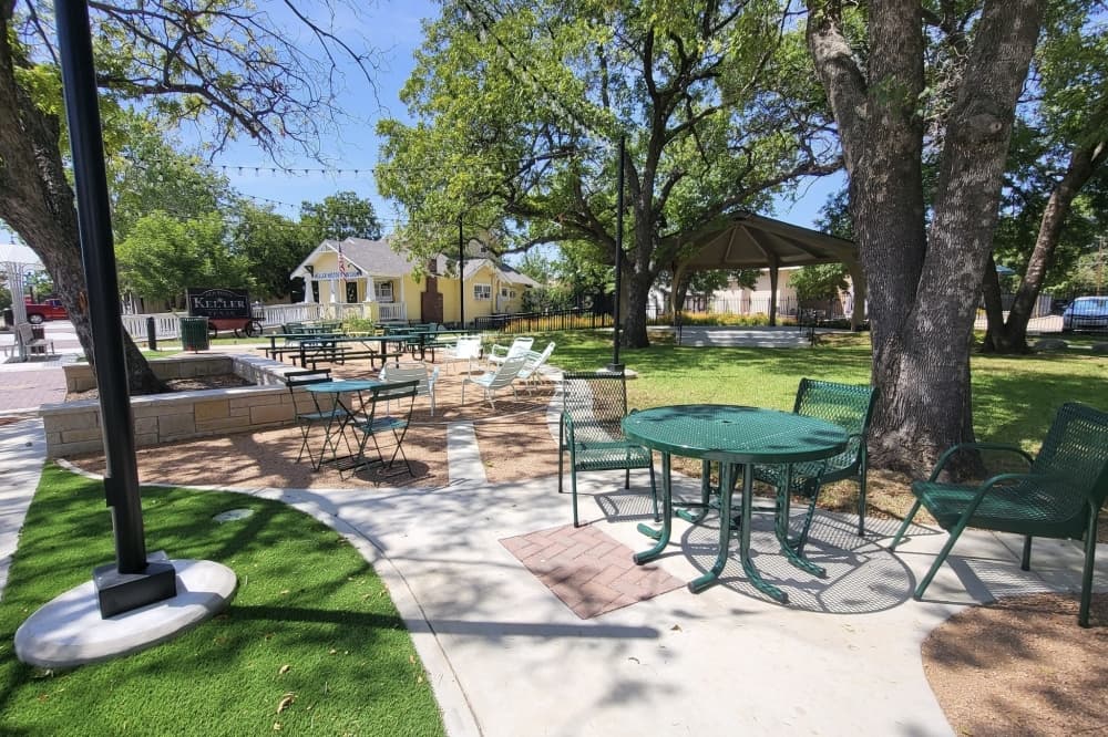 Walking paths, tables and chairs at park