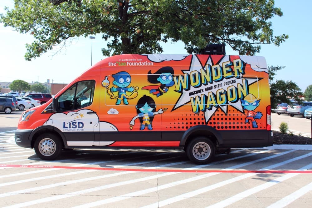 Van with Wonder Wagon signage. 