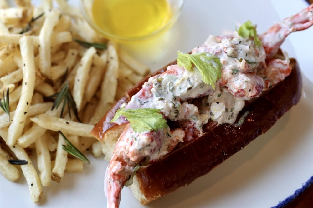 The menu features a variety of seafood options, including Maine Lobster Roll ($30) pictured here. (Courtesy Pacific Table)