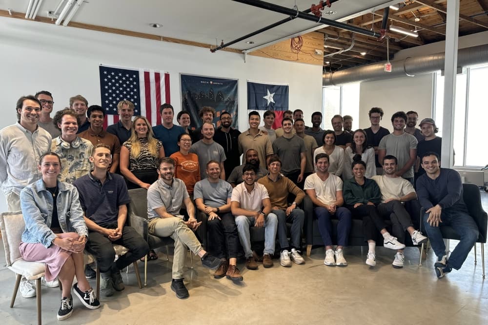 A team photo of the Base Power Company team in their office. 