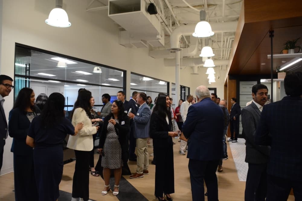 Various officials, community members and Startup Runway employees gather in the Innovation Quarter Headquarters prior to the announcement of an economic development partnership between the city of Richardson and Startup Runway. 