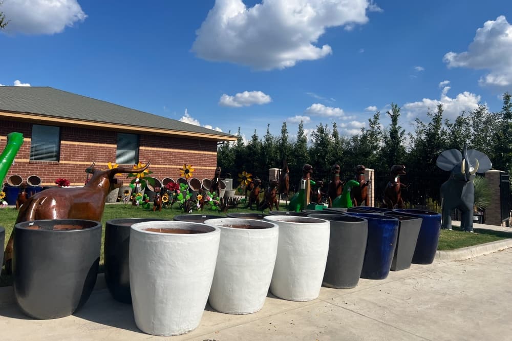 Pots and animal-themed yard accessories