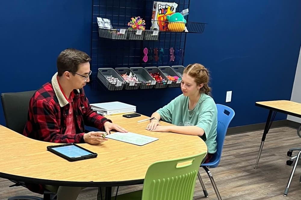 a Sylvan teacher tutoring a student