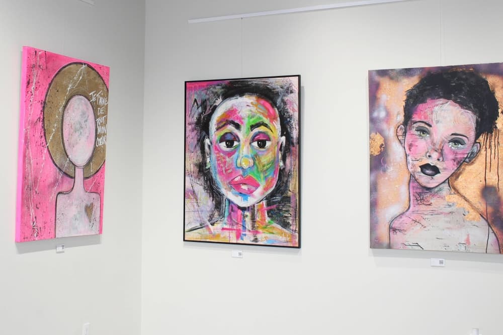 Three paintings in various styles. 