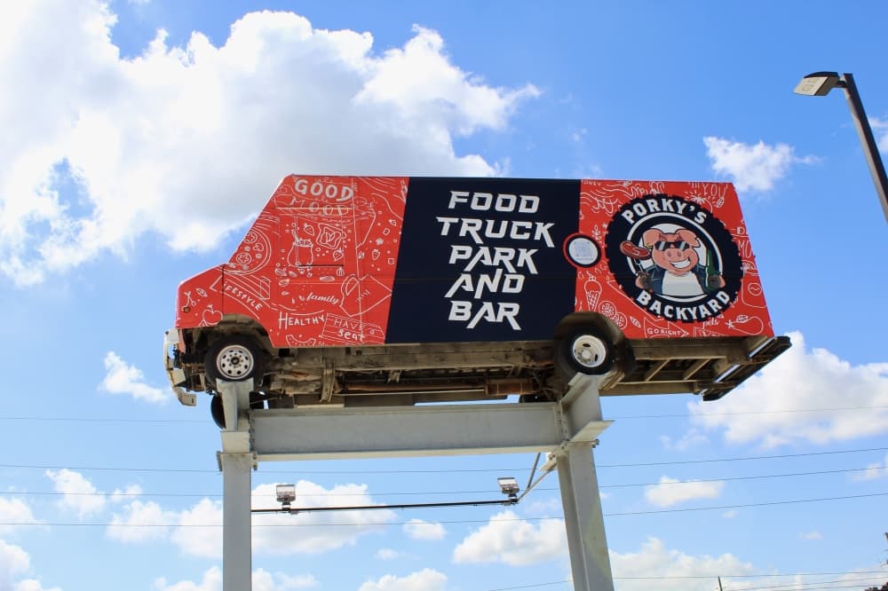 Porky's Backyard food truck park has 16 consistent food trucks. (Jovanna Aguilar/Community Impact)