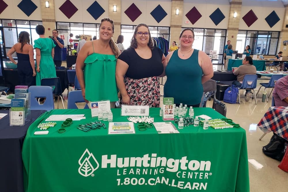 A photo of the Huntington Learning Center of Georgetown booth at a community event. 