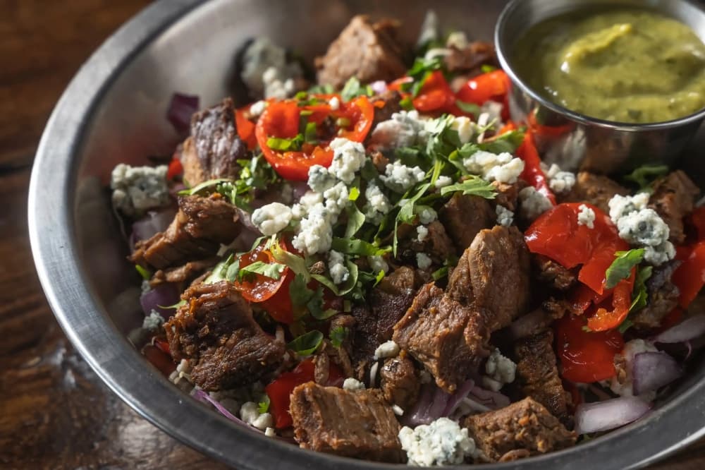 On top of offering around 40 craft beers, ciders, cocktails and wine taps, the menu will include burgers, charcuterie, chopped salads and more.   (Courtesy Oz. Tap House)