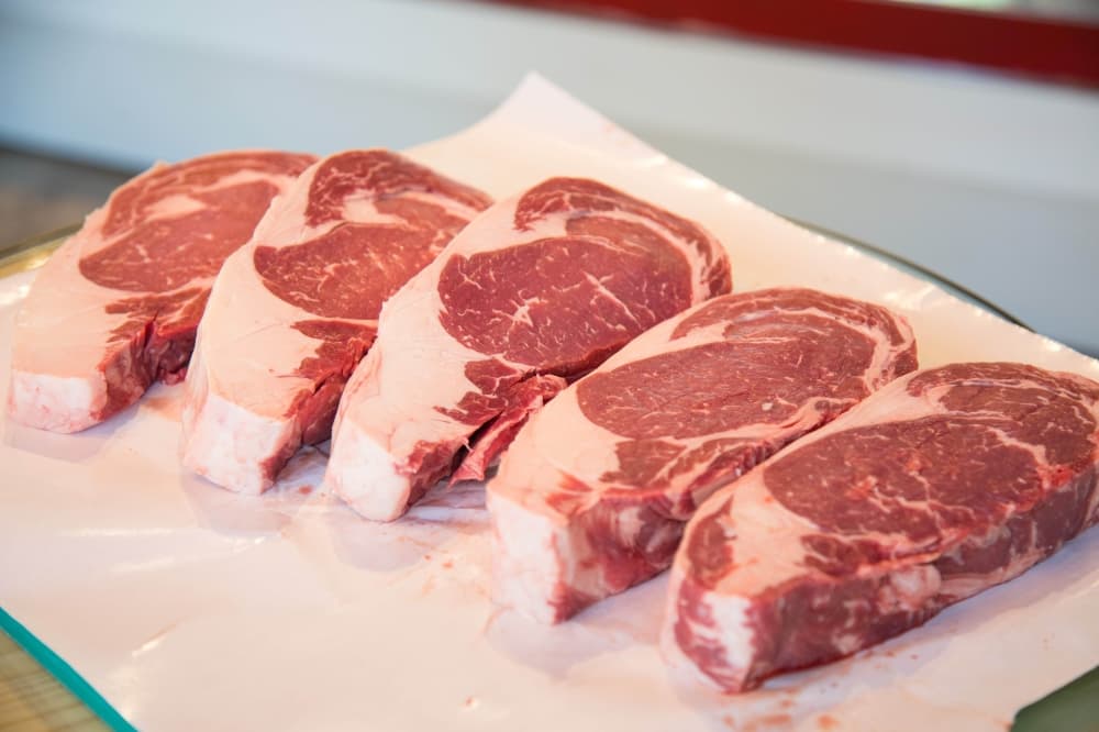 Several cuts of meat. 