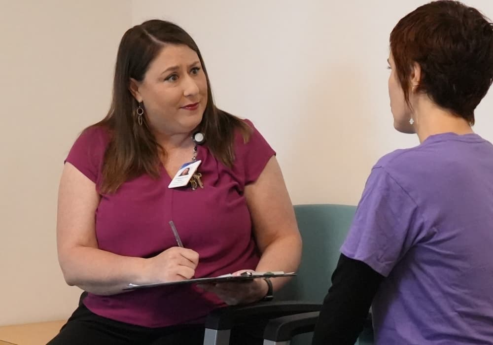 Integral Care team members support clients through the intake process. 