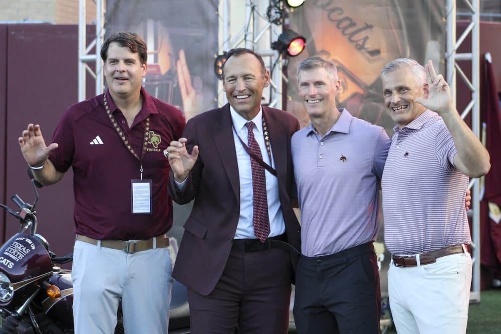 Texas State University and University Federal Credit Union officials celebrated new signage
