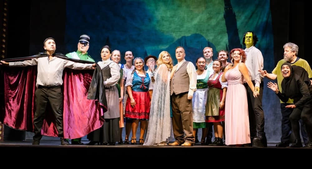 The full cast is shown during a dress rehearsal.