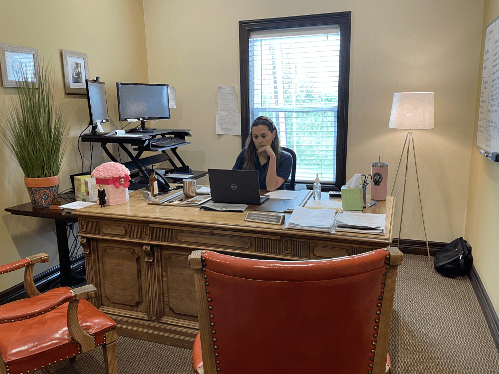 Cristina "La Mera Mera Abogada" García-Chappell hard at work in her office