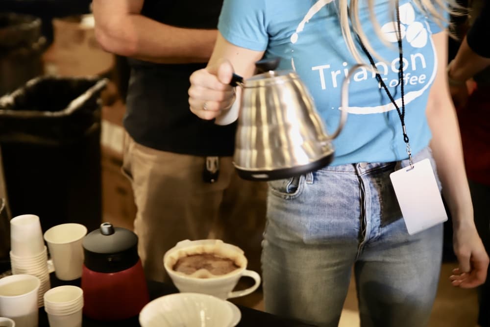 A Trianon barista brews a pour over for tastings at the first Austin Coffee Festival.