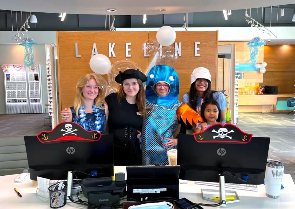 The Lakeline Vision Source team smiles for a photo on Kids Day. 