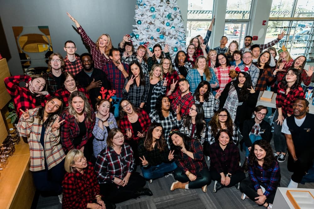 The Lakeline Vision Source team wears holiday pajamas for its Christmas photo. 