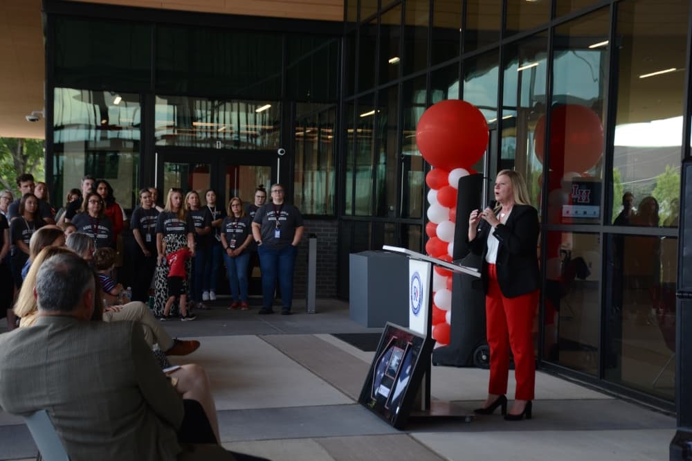 Richardson ISD Superintendent Tabitha Branum addresses Lake Highlands Middle School staff and the public at a ribbon cutting ceremony Sept. 5. 