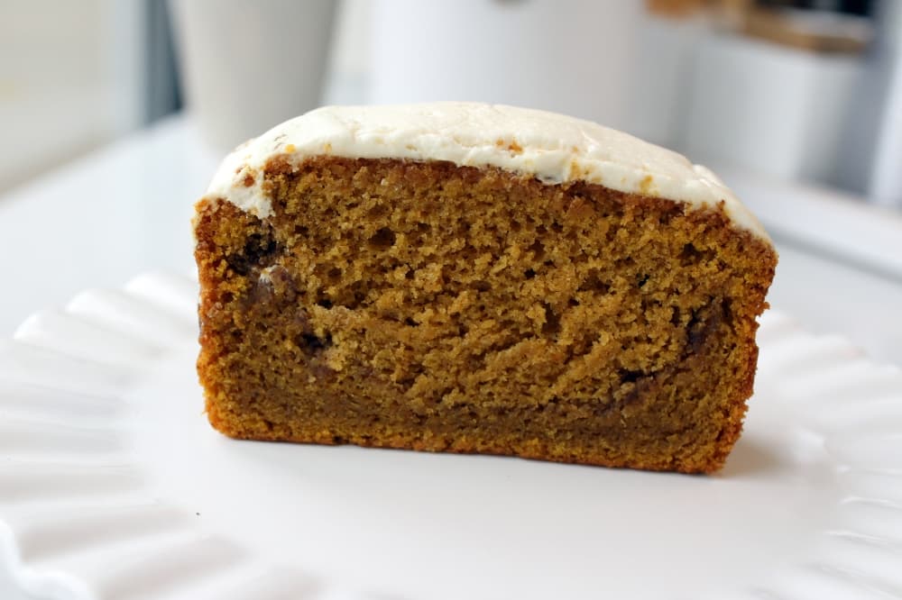 Side view of bread with frosting.