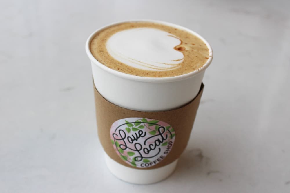 Cup of coffee with foam art. 