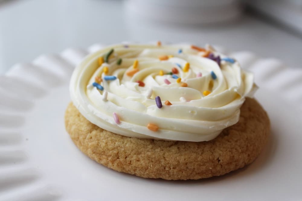 Cookie topped with frosting and sprinkles. (Karen Chaney/Community Impact)