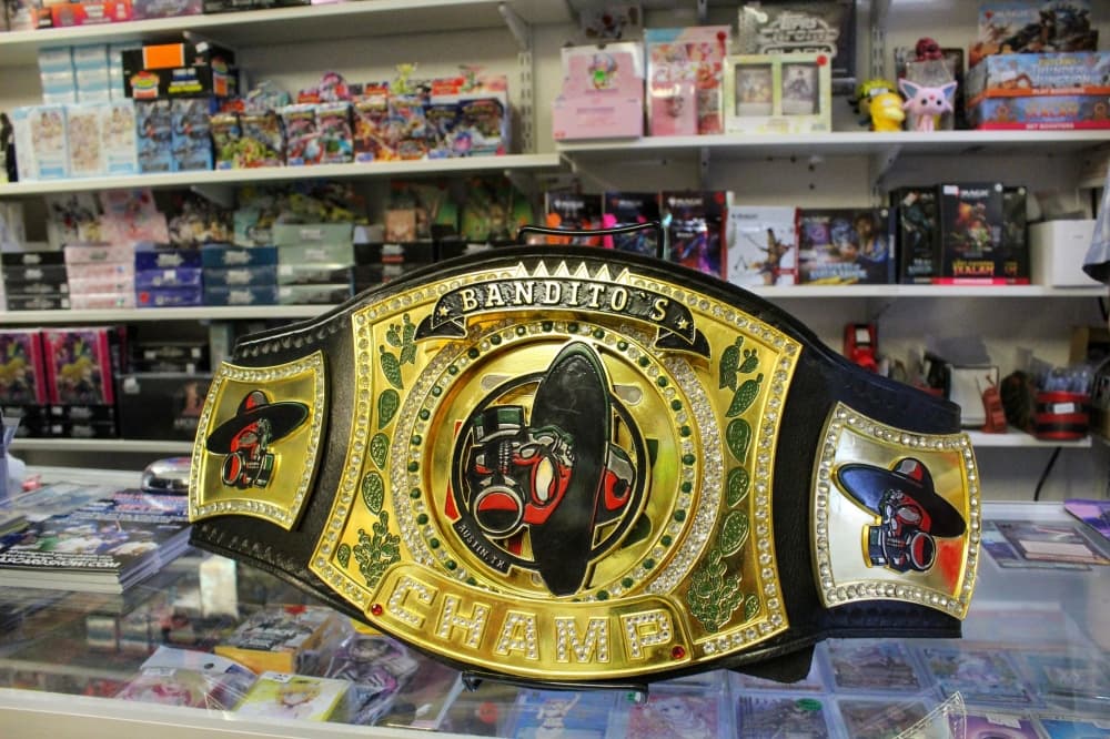 An image of the Bandito's championship belt with the store logo. 