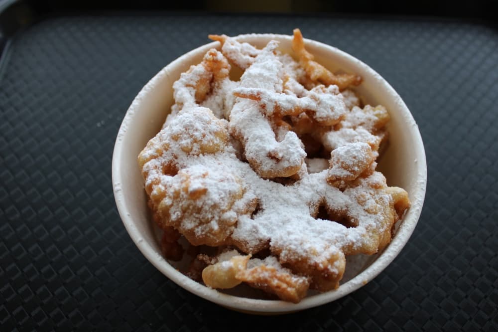 Funnell cake with powdered sugar.
