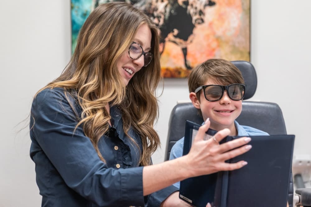 Dr. Browne works with a patient at The Center for Vision Development.
