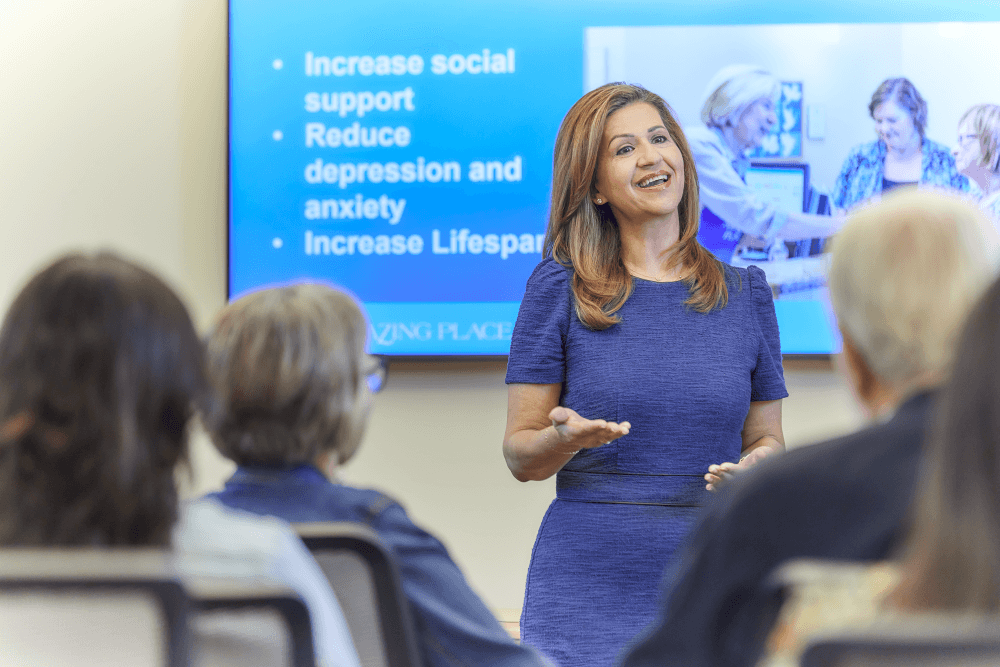 Amazing Place staff member Mehrnaz Gill teaches brain health education to interested community members.  