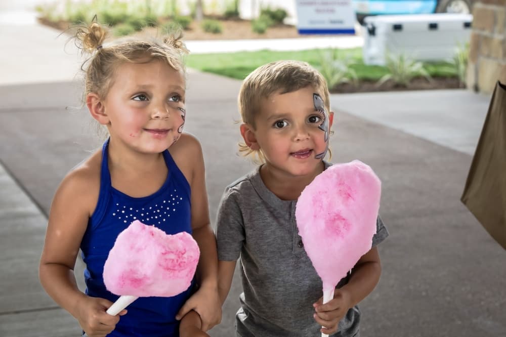 kids with cotton candy