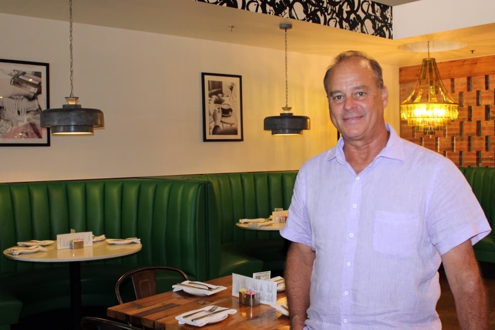 Todd Kerr standing in San Daniele Italian Eatery & Bar. 