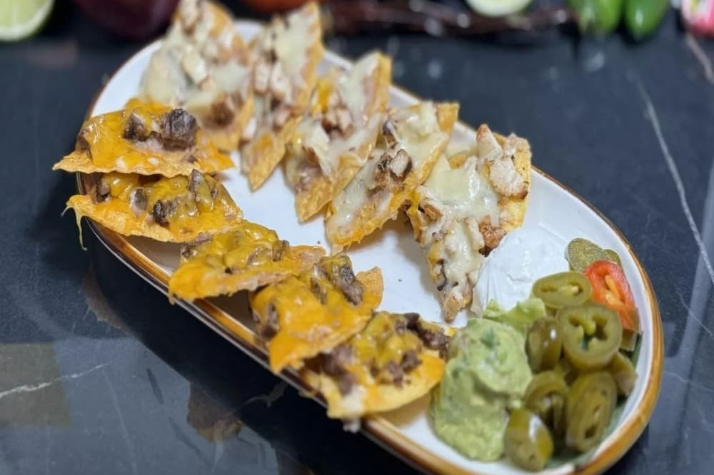 A plate of nachos at MAD Mexican Grill