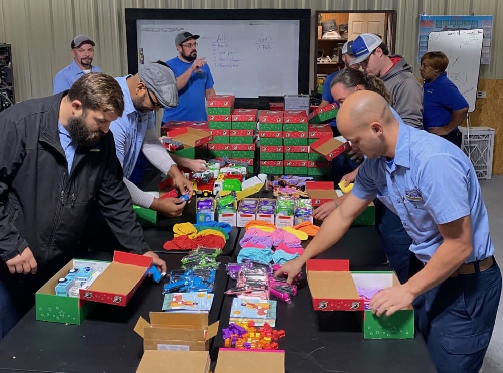 Every Christmas, the Easco team prepares shoeboxes for Samaritans Purse to bless children overseas. 