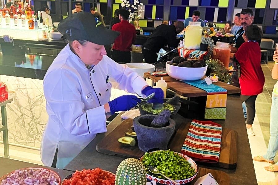 worker making guacamole 