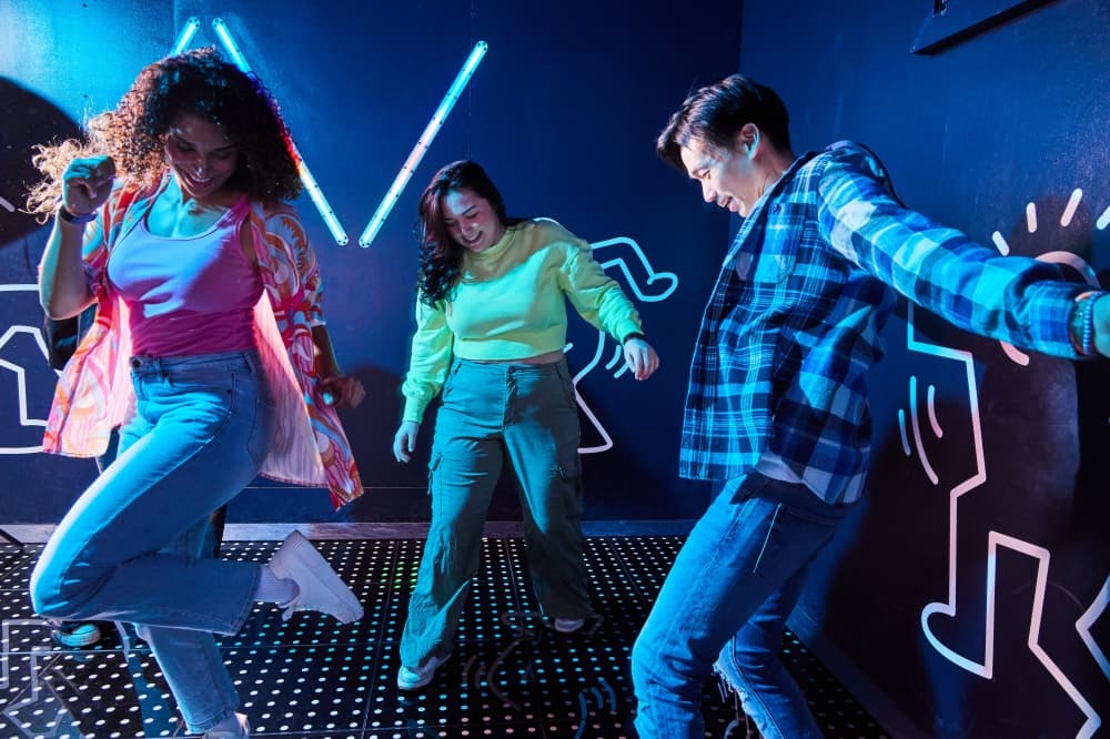 people playing at an indoor game room
