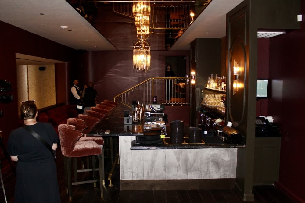 The upstairs bar services the two smaller auditoriums and the private screening room. (Cassandra Jenkins/Community Impact)