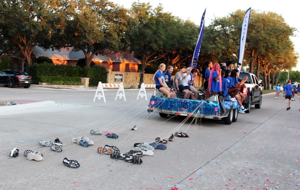 Students on a trailer in a parade.