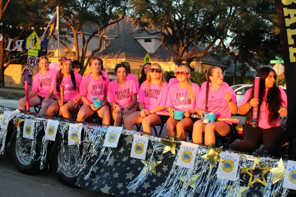 Students on a trailer in a parade.